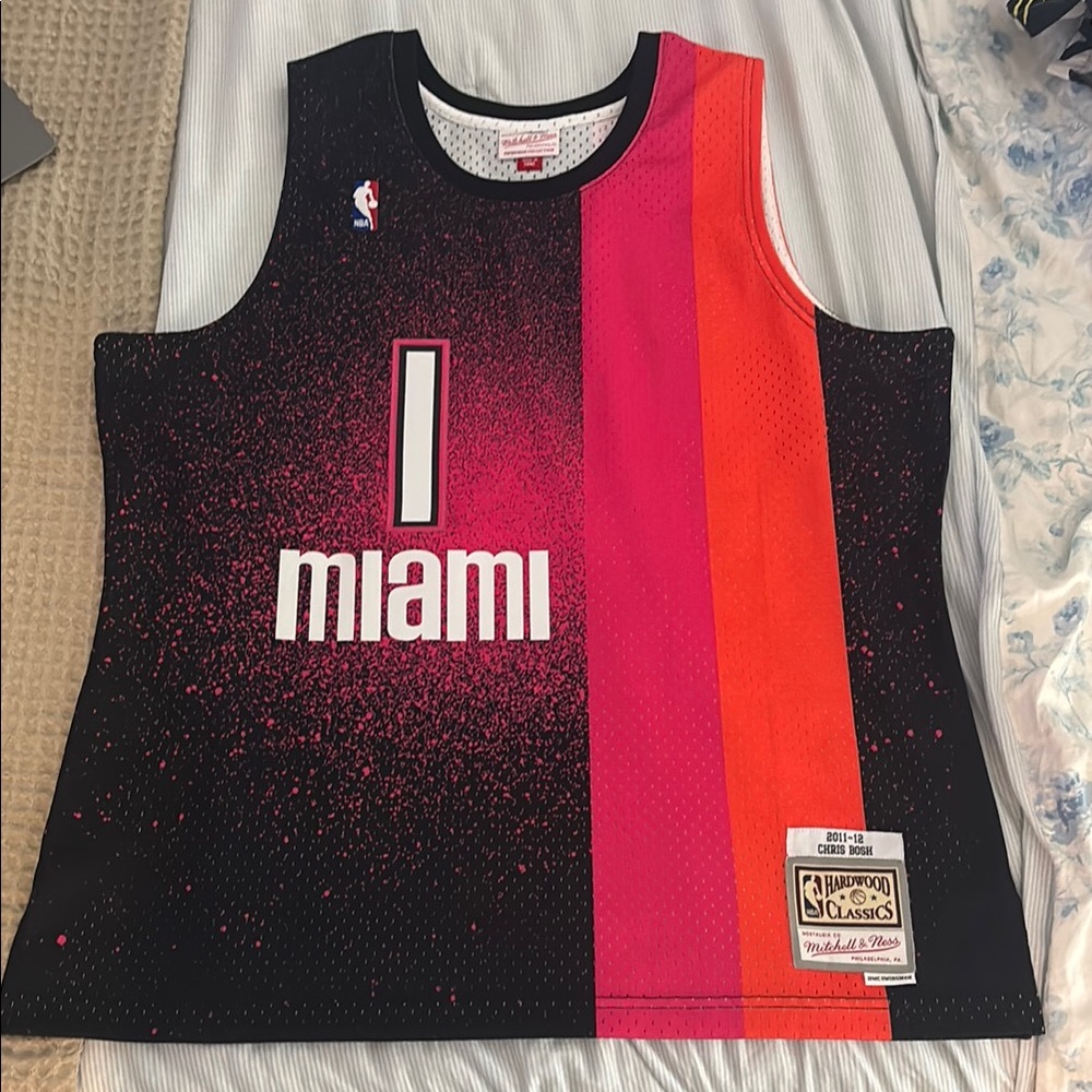Mitchell & Ness Black and Pink Basketball Jersey. Chris Bosh.